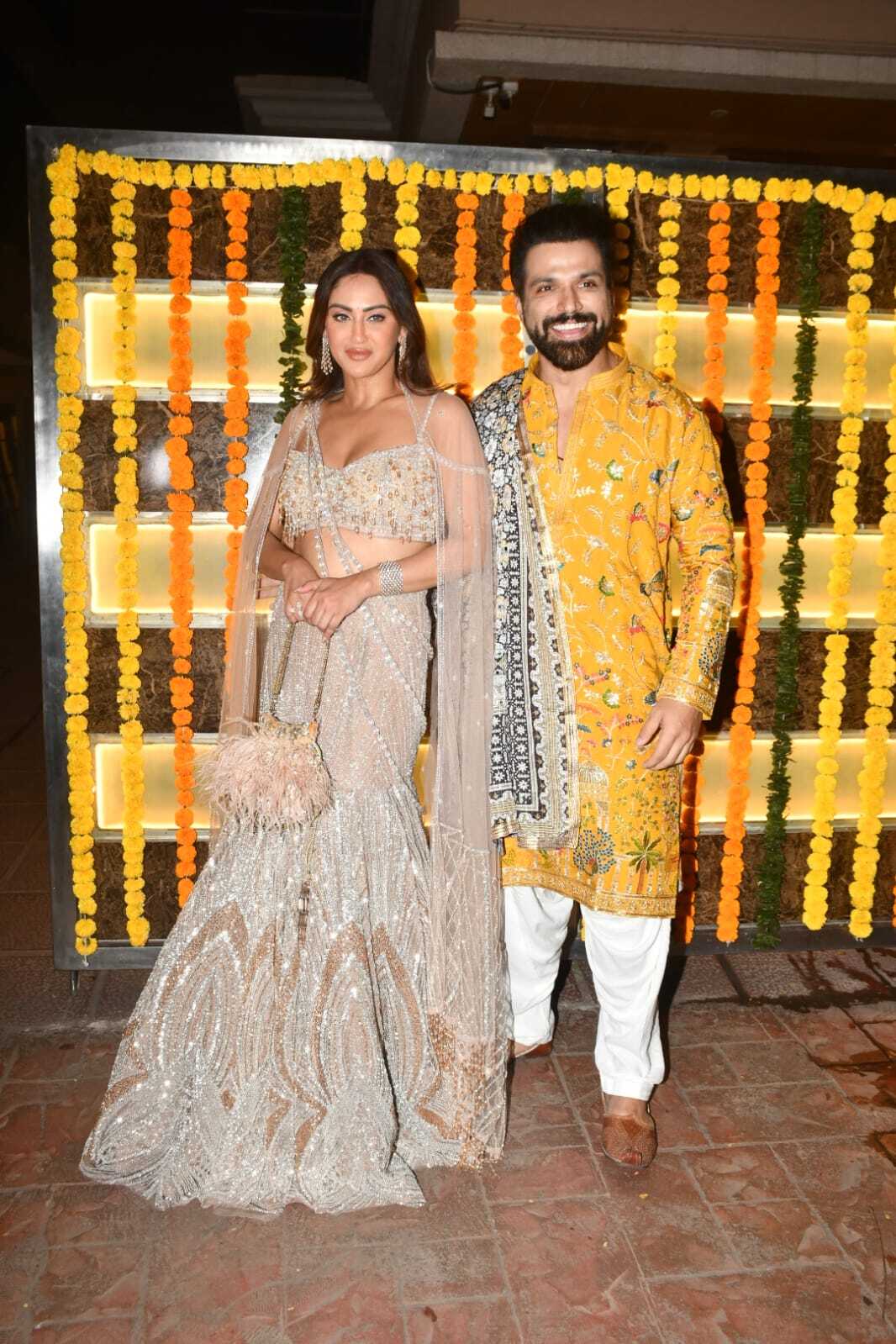 Rithvik Dhanjani arrived with BFF Krystle D'Souza at the party. The actors indulged in fun banter with paps.While the diva looked breathtakingly gorgeous in golden lehenga, the actor complimented her in yellow kurta set.